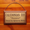 8x4 brass plaque on walnut with chain