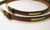 One inch belts with engraved plate